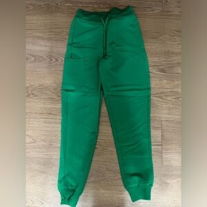 Brand new. Never worn. Mandala scrubs. Emerald green